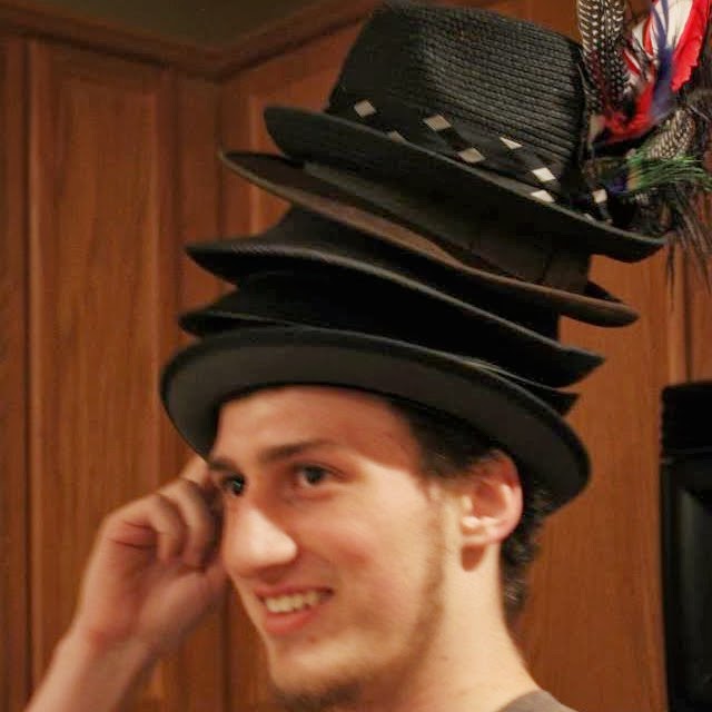 Andrew wearing hats